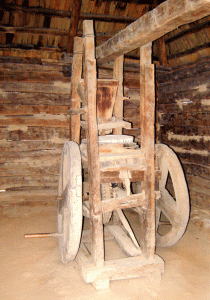 Moară manuală folosită în secolul XIX folosită pentru măcinatul cerealelor