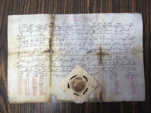 Document scris în slavonă, cu kirilice şi sigiliu timbrat, care se află la Arhivele Statului de la Târgu Jiu